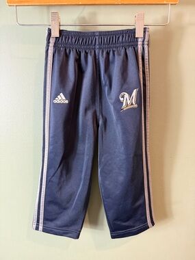 Adidas Kids Navy Blue Track Pants with Side Stripes and Logo